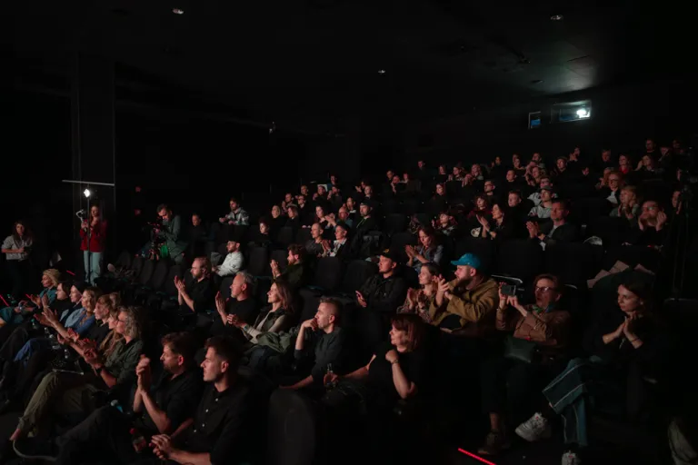Warsaw film festival, theatre and people watching movies.