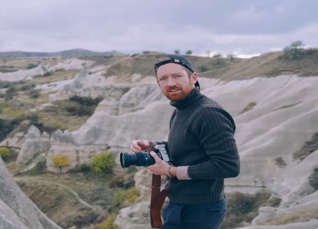 Portrait of Canadian filmmaker and storyteller Brodie Vissers. Nature and mountain scene.