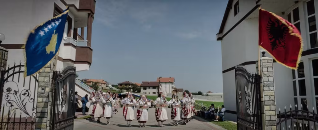 Kosova history and culture icon on picture with flags.
